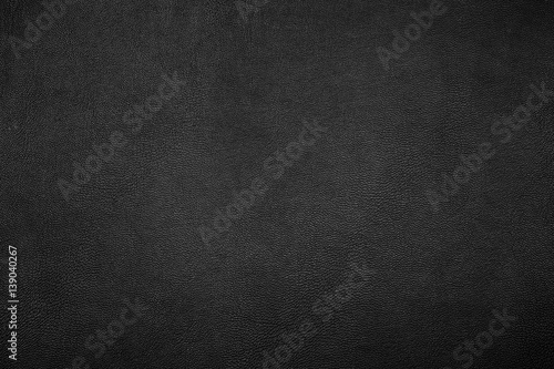 Black leather texture close up background.