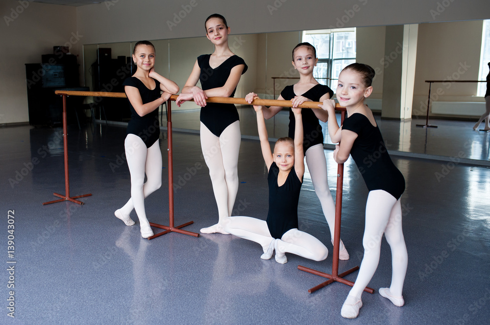 A group of children engaged in choreography. A group of children engaged in choreography.