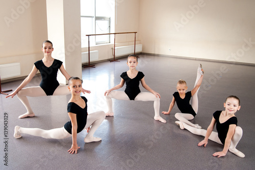A group of children engaged in choreography.