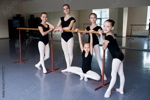A group of children engaged in choreography.