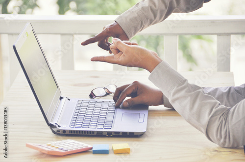 Wallpaper Mural Business woman investment consultant analyzing company seal report balance sheet statement working with documents on laptop computer. Concept picture of economy, market, office,money and tax. Torontodigital.ca