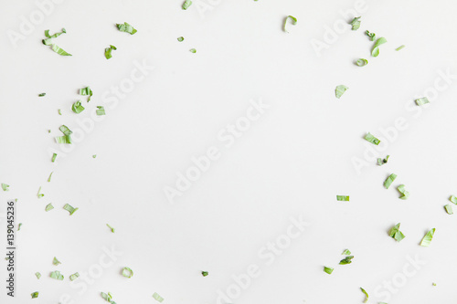 Frame of green leaves on a white background - for menu design