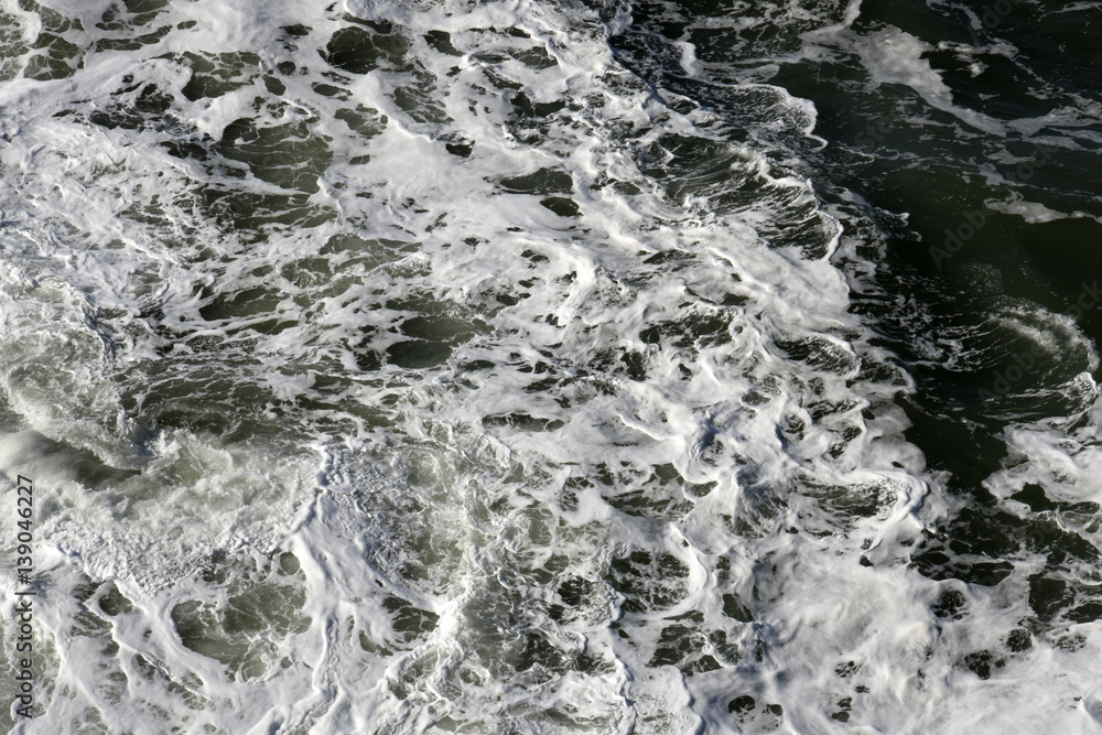 Rough foamy ocean water Rough foamy ocean water