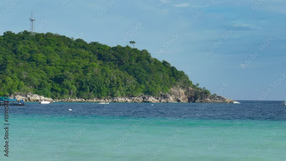 View on stone coast cape of Koh Lipe island in the Andaman Sea, Thailand, 4k
View on stone coast cape of Koh Lipe island in the Andaman Sea, Thailand, 4k