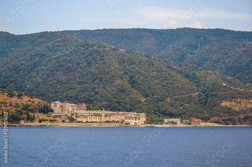 Orthodox Greek monastery on Mount Athos. View from sea. Xenophon. © Aleksandr