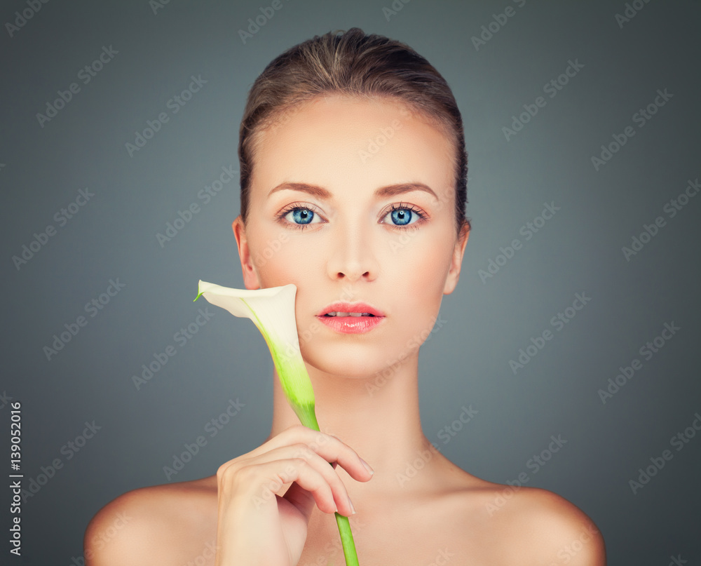 Healthy Woman with Perfect Skin and White Lily Flowers. Aesthetic Medicine and Spa Beauty Healthy Woman with Perfect Skin and White Lily Flowers. Aesthetic Medicine and Spa Beauty