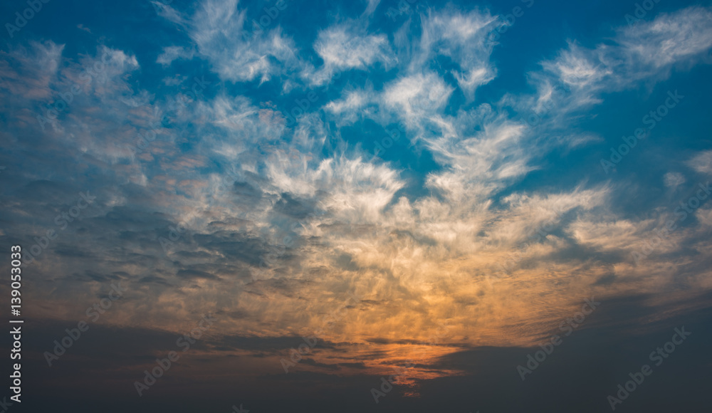 Obraz premium sunset back lighting the clouds.