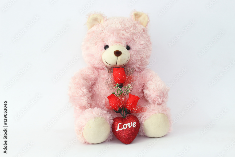 Teddy bears, pink and red roses on a white background.