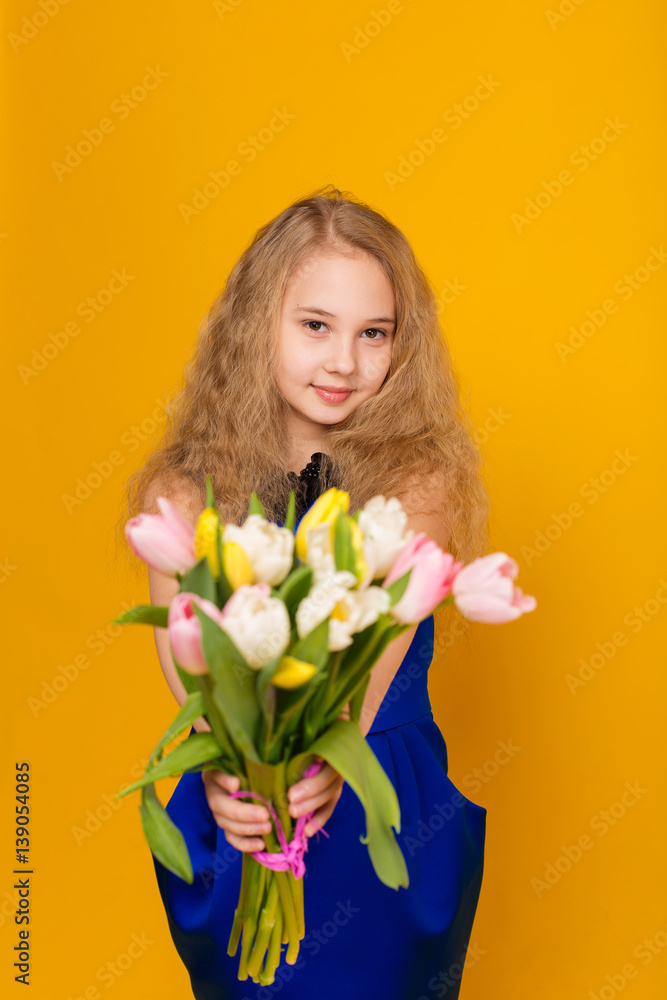 Beautiful girl with a bouquet of tulips Beautiful girl with a bouquet of tulips