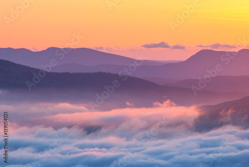 Valley covered with low clouds © Bashkatov