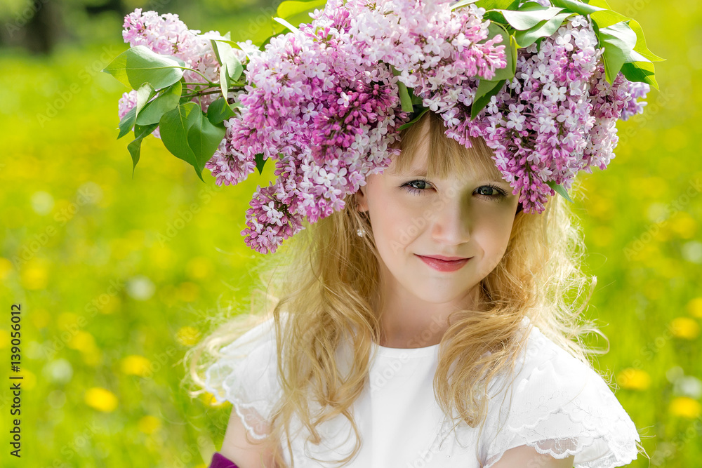 Girl in lilac garden Girl in lilac garden