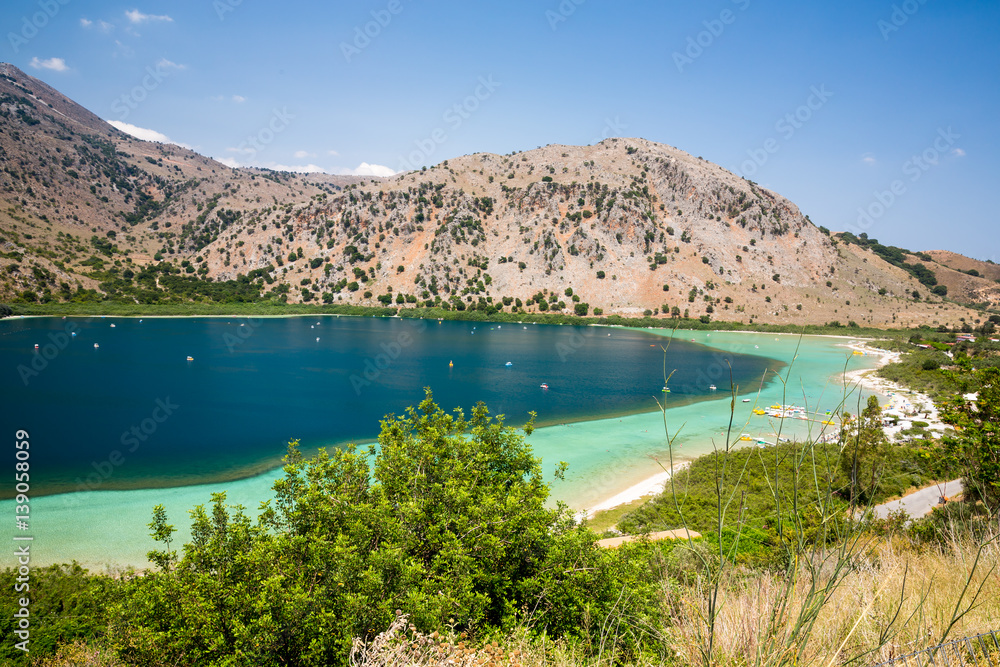 Beach in village Kavros in Crete island, Greece. Magical turquoise waters, lagoons. Travel Background