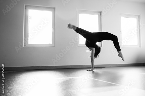 woman dancer practice floor jump on ballet class