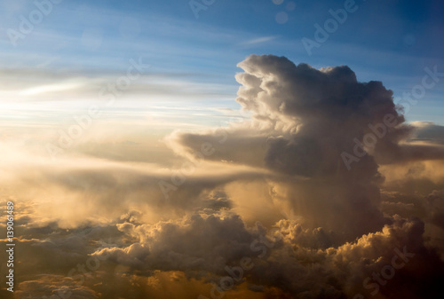 View of the clouds and airplane wing from the Inside