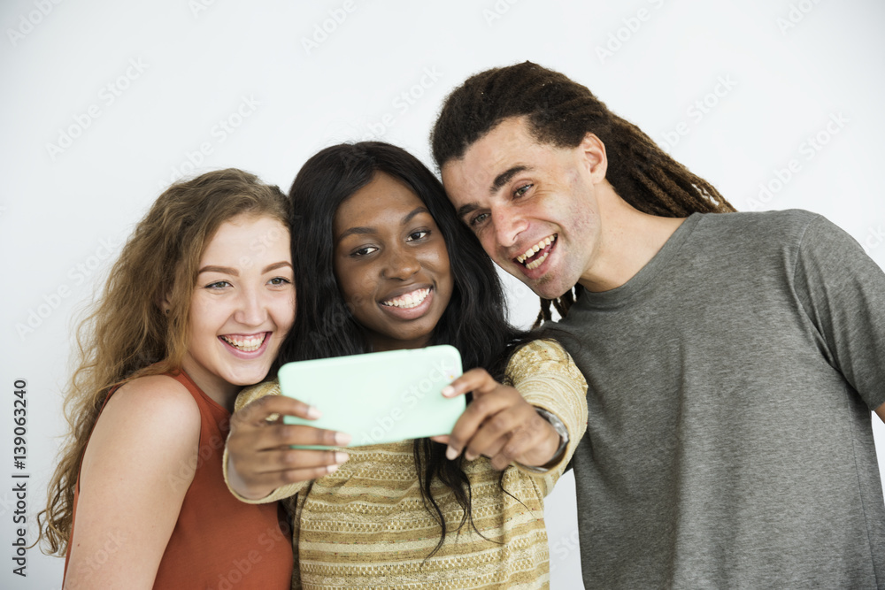 Diverse group of friends taking groufie Diverse group of friends taking groufie