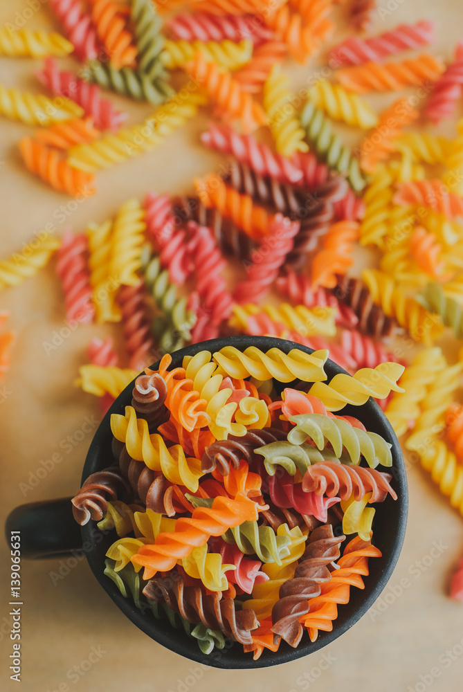 colorful italian fusilli pasta in a jar
