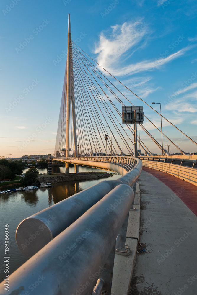 Cable bridge over Sava river at sunset in Belgrade, Serbia