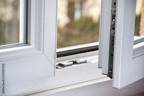 Secure anti-theft burglars-proof window locking mechanism – strong modern PVC metal window photo