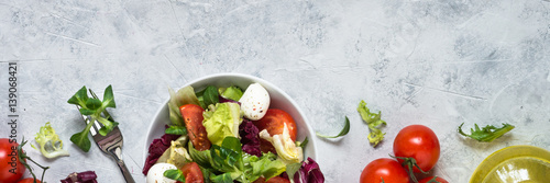 Fresh salad in a bowl. Long banner format