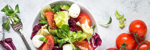 Fresh salad in a bowl. Long banner format