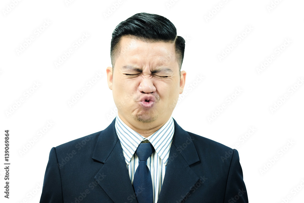 Asian men are exercising facial muscles, pucker up and eyes closed Asian men are exercising facial muscles, pucker up and eyes closed