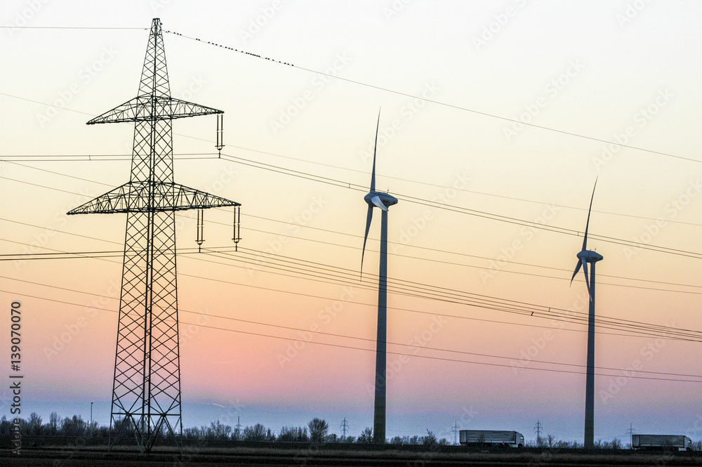 Wind energy plant near Parndorf, wind turbine, high tension cabl Wind energy plant near Parndorf, wind turbine, high tension cabl