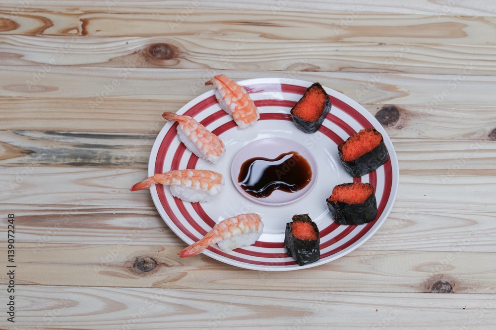 Sushi Close up in black plate on wooden background, Asian food delicious : Top view photo :