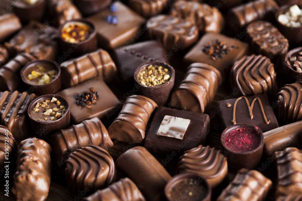 Praline Chocolate on wooden backgroud Praline Chocolate on wooden backgroud