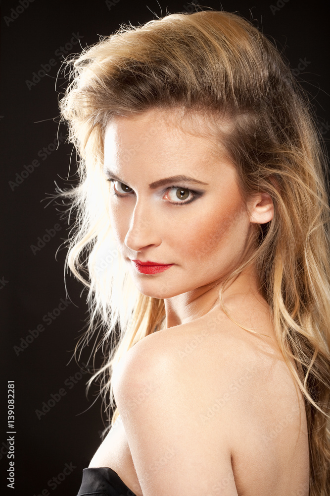 Fototapeta premium Young Woman with Blond Hair and Disco Makeup.
