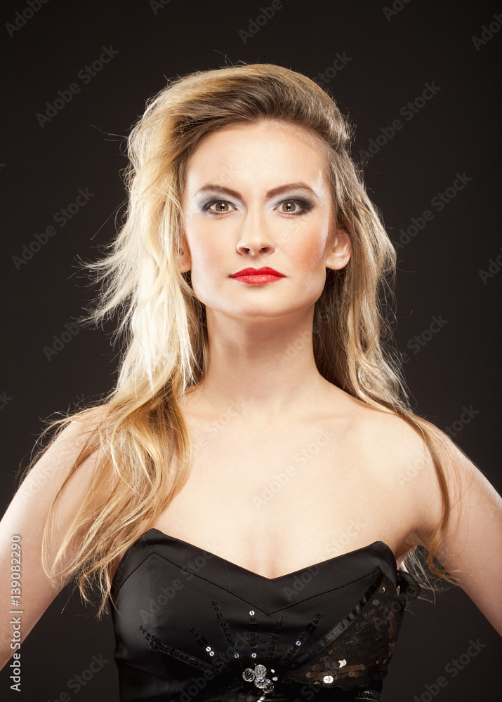 Young Woman with Blond Hair and Disco Makeup. Young Woman with Blond Hair and Disco Makeup.
