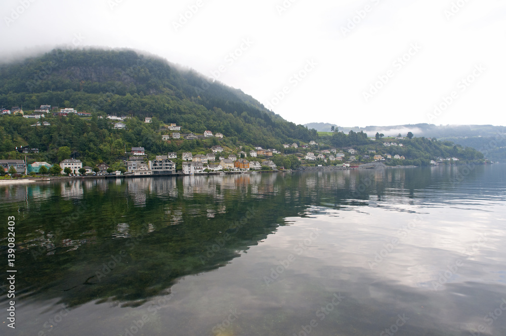 Country side Norway with a village along a fjord