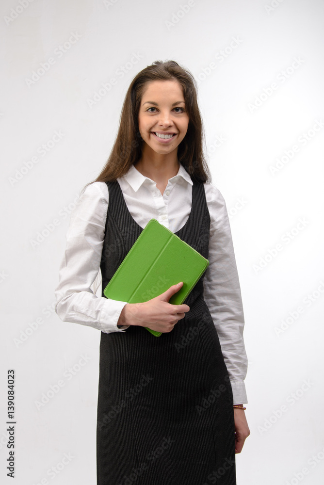Attractive young business woman holding a green digital tablet, on white Attractive young business woman holding a green digital tablet, on white