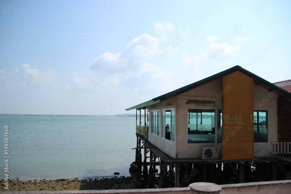 house on the beach and sea view background house on the beach and sea view background