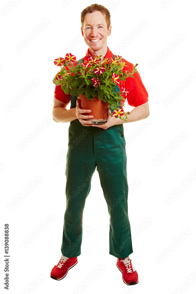 Mann als Gärtner mit grüner Latzhose Stock Photo Adobe Stock