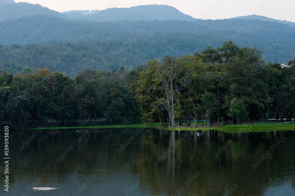 Ang Kaew in Chiang Mai University large reservoir is popular with tourists. Ang Kaew in Chiang Mai University large reservoir is popular with tourists.