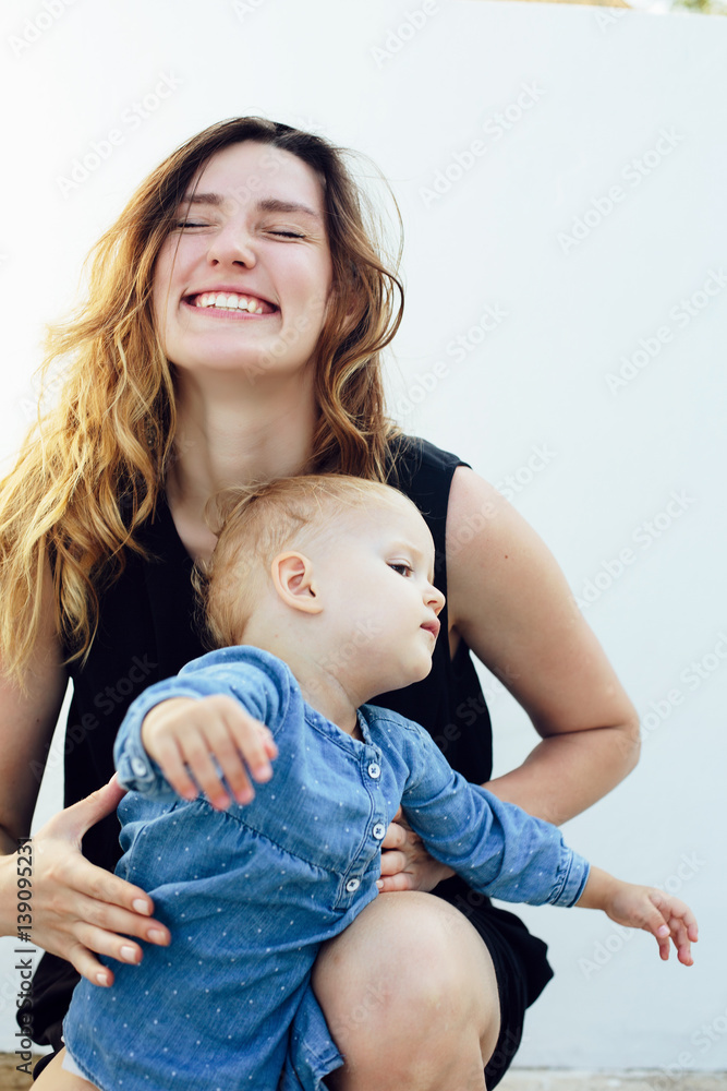 laughing happy mother and daughter laughing happy mother and daughter