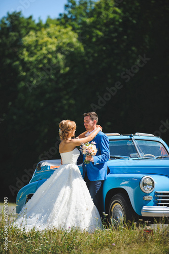 Bride and Groom by Cabriolet © photographmd