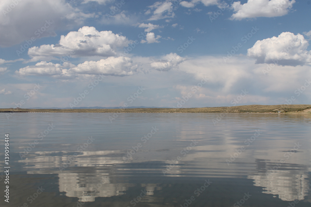 the sky reflected in the water, deserted beach lake, summer sky, nature, blue cloud,