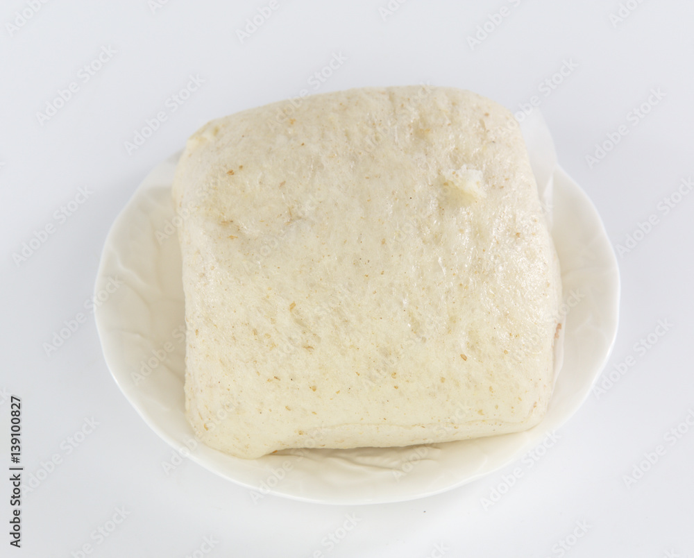 steamed bread on white plate
