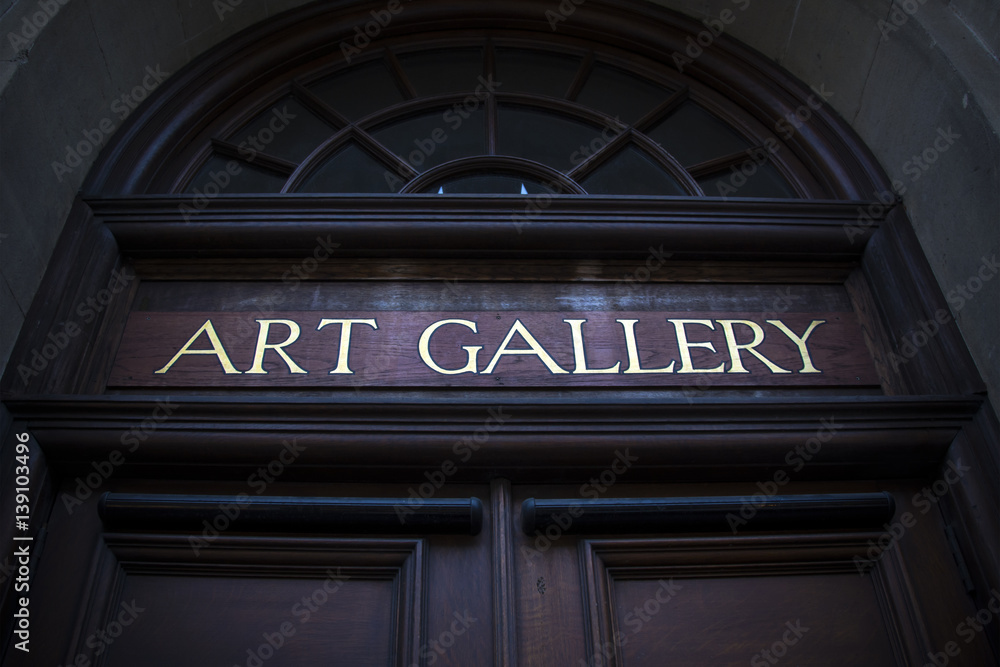 Art gallery sign above doorway