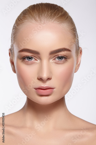 Close-up portrait of attractive girl with natural makeup.
