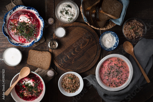 Dishes of traditional Russian cuisine on the wooden table horizontal © deniskarpenkov