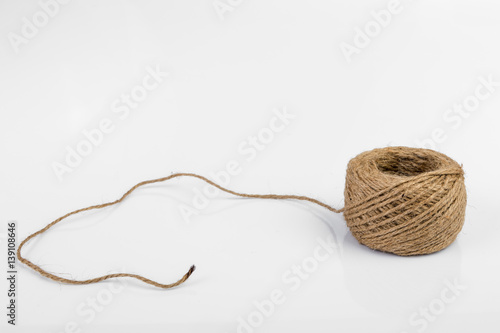Skein of jute twine isolated on white background.