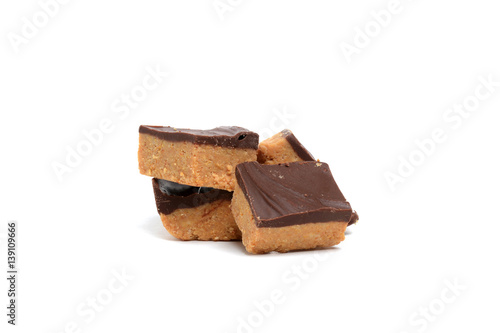   pieces of peanut butter fudge white background