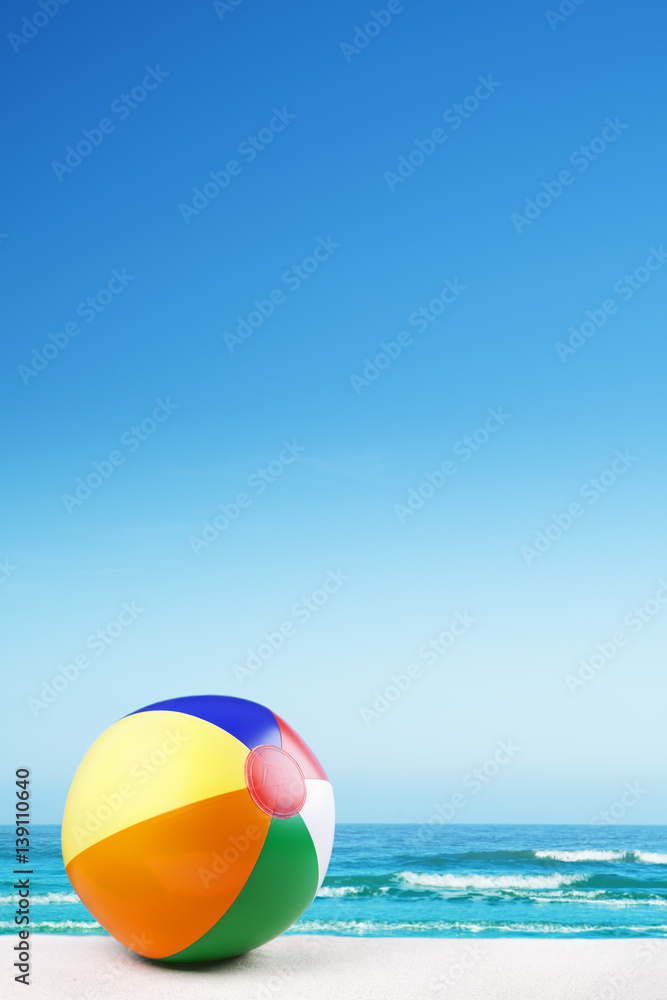 Beach ball on the beach on a clear sunny day