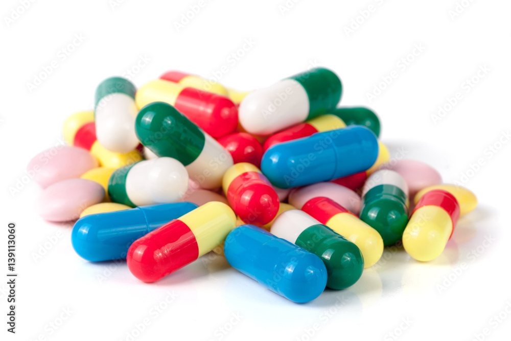 colorful pills isolated on white background colorful pills isolated on white background