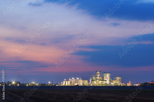 Power plant green energy at sunset twilight background, Thailand © Akarapong Suppasarn