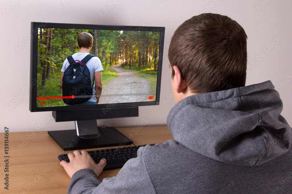 travel blog concept - man watching video at home travel blog concept - man watching video at home