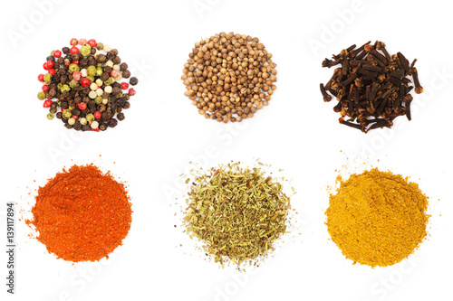 Colorful spices and herbs for cooking background and design isolated