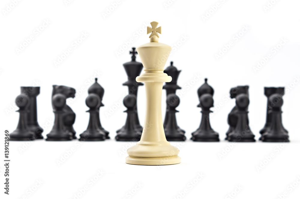 Chess business concept, leader & success. Black king and queen above defeated white king Chess business concept, leader & success. Black king and queen above defeated white king